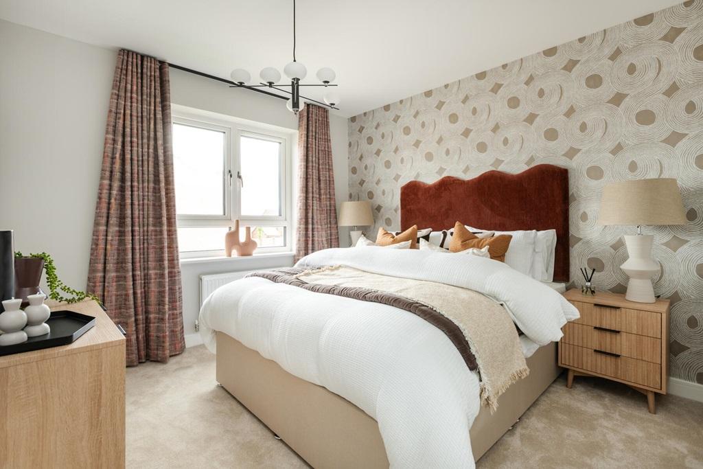 Relax after a long day in the main bedroom