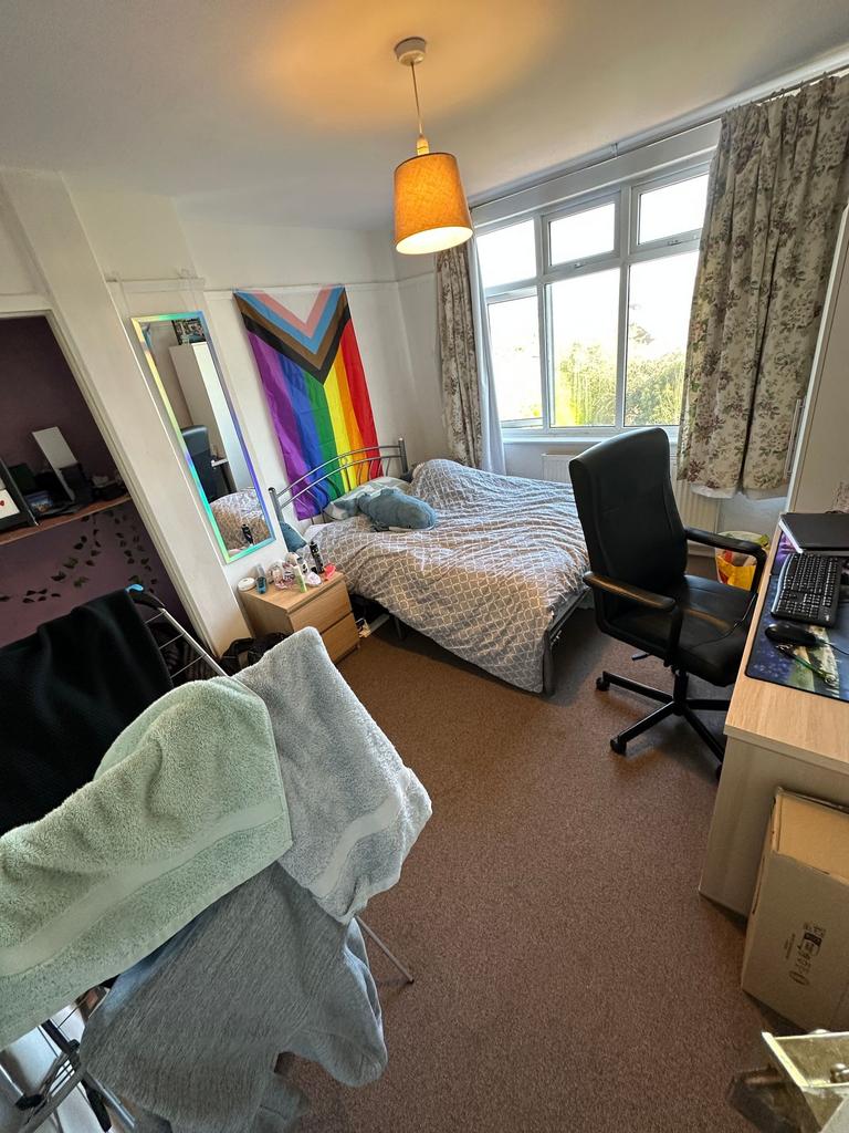 Bright, spacious bedroom with large study area...