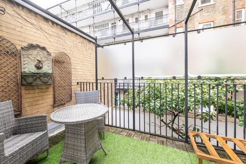 undefined, Romney Mews, London W1U