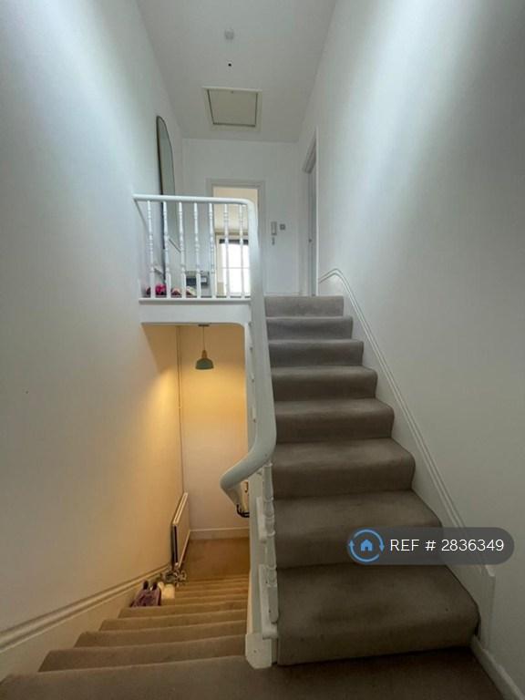 From Kitchen/Bathrm Down To Entry And Up To Bedrm