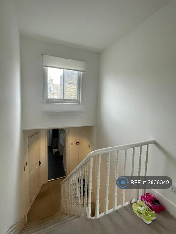 Looking Down To Bathroom/Kitchen From Bedroom