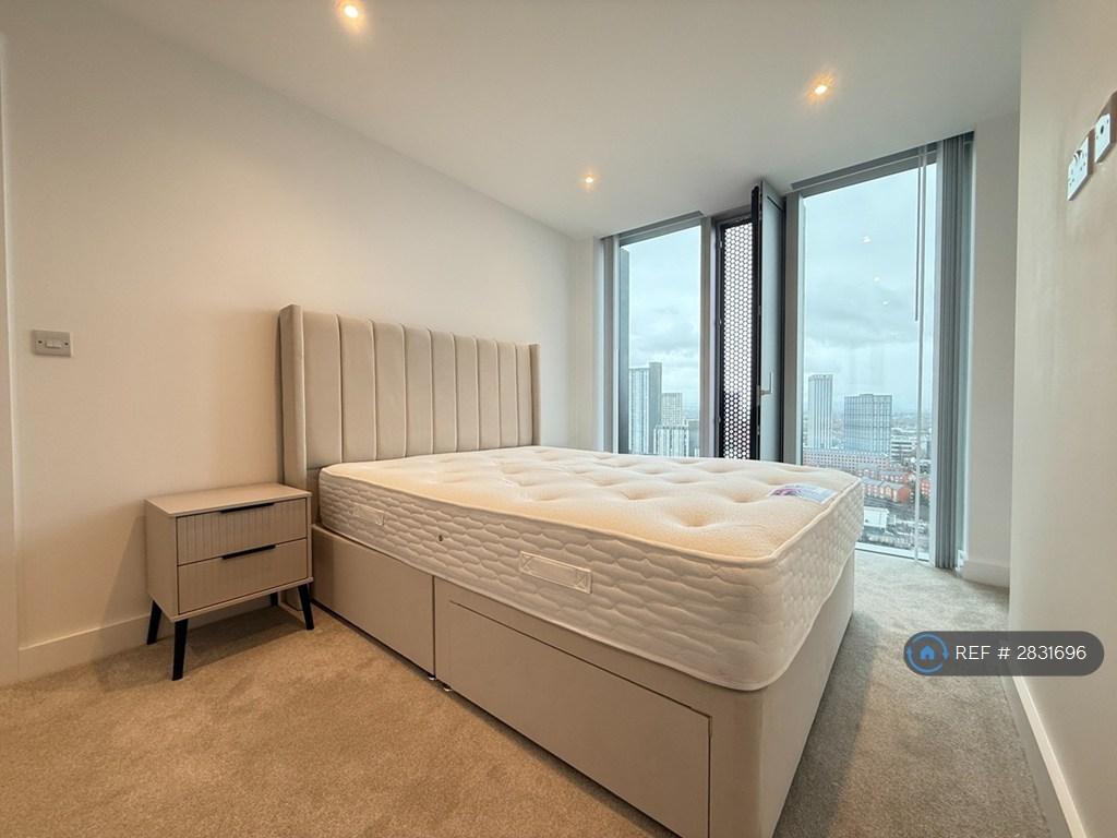 Bedroom With King-Size Storage Bed