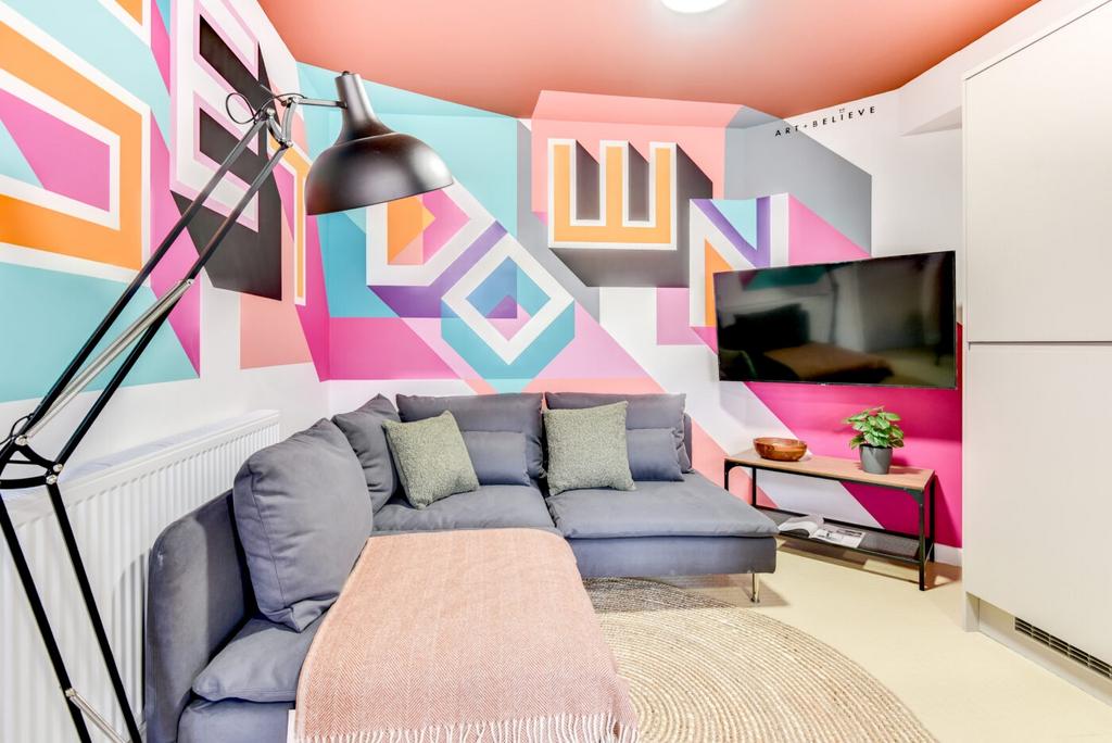 Bright, stylish living area with a comfortable ...