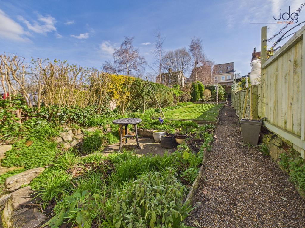 Long, private garden with patio and mature...