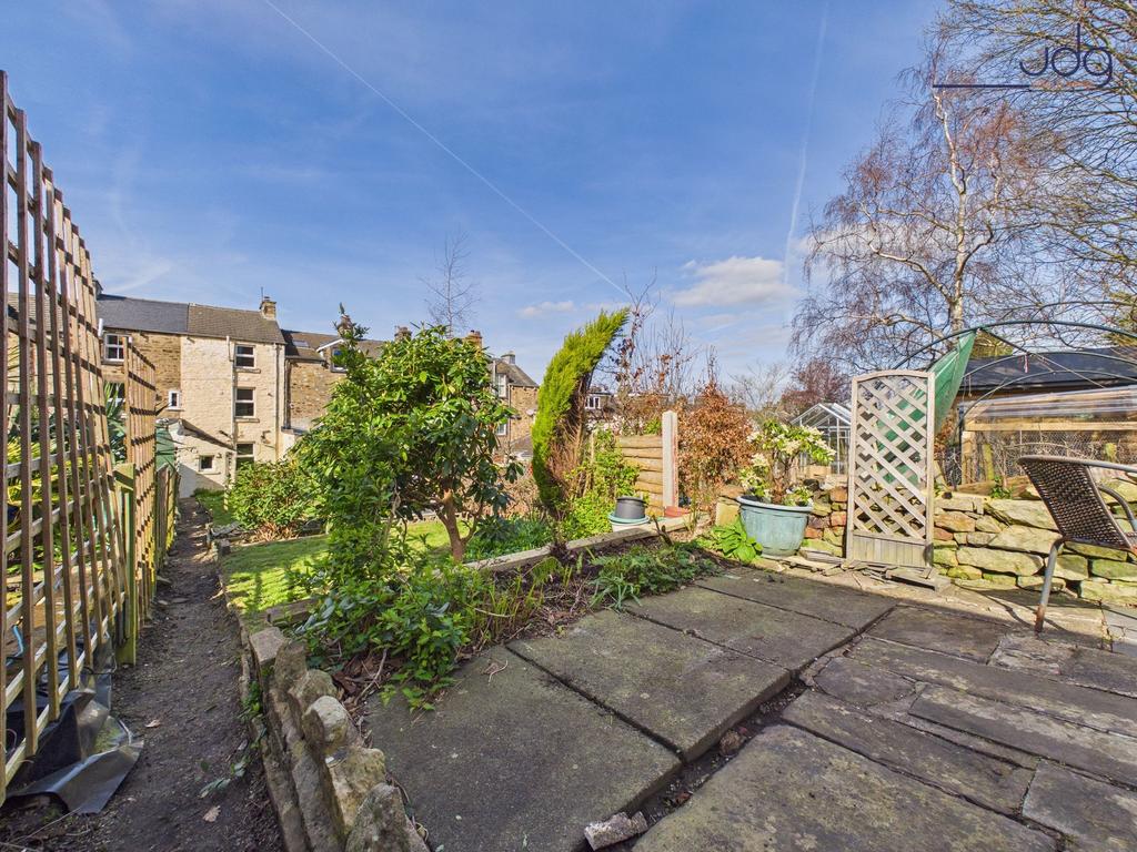 Long, private garden with patio and mature...