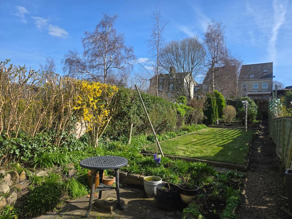 Long, private garden with patio and mature...