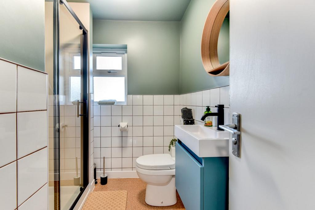 Fresh modern bathroom with a walk-in shower, wh...