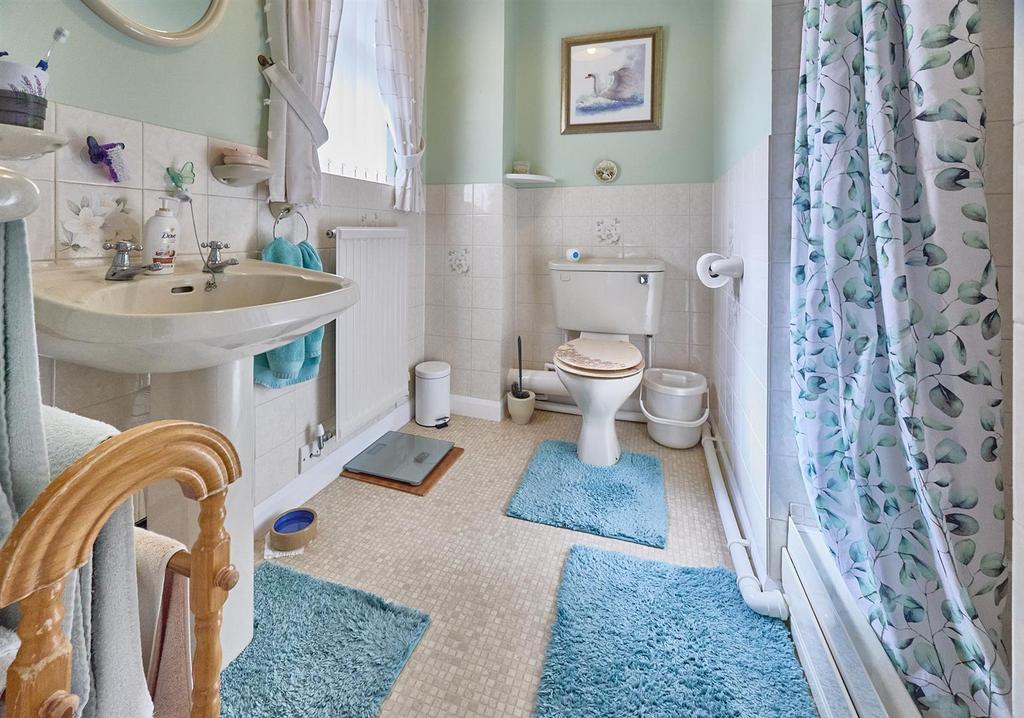 En suite shower room to front