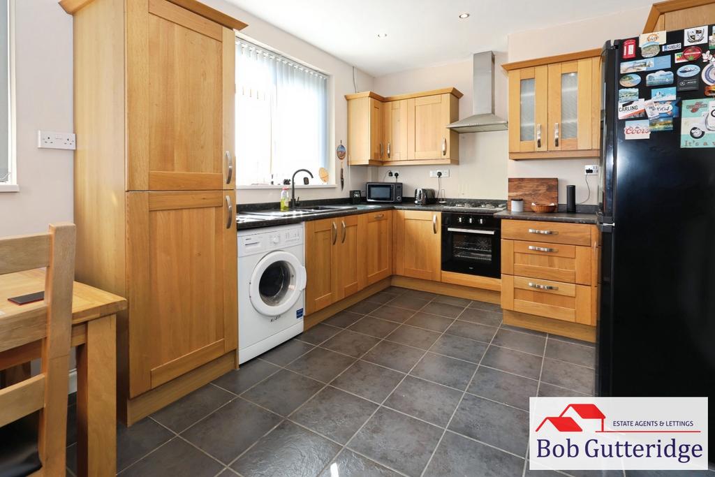 Open plan fitted kitchen / dining room