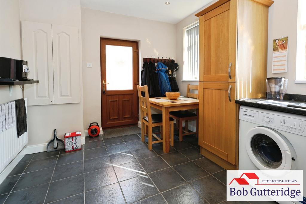 Open plan fitted kitchen / dining room