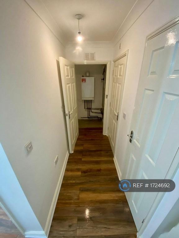Hallway Leading To Storage Cupboard