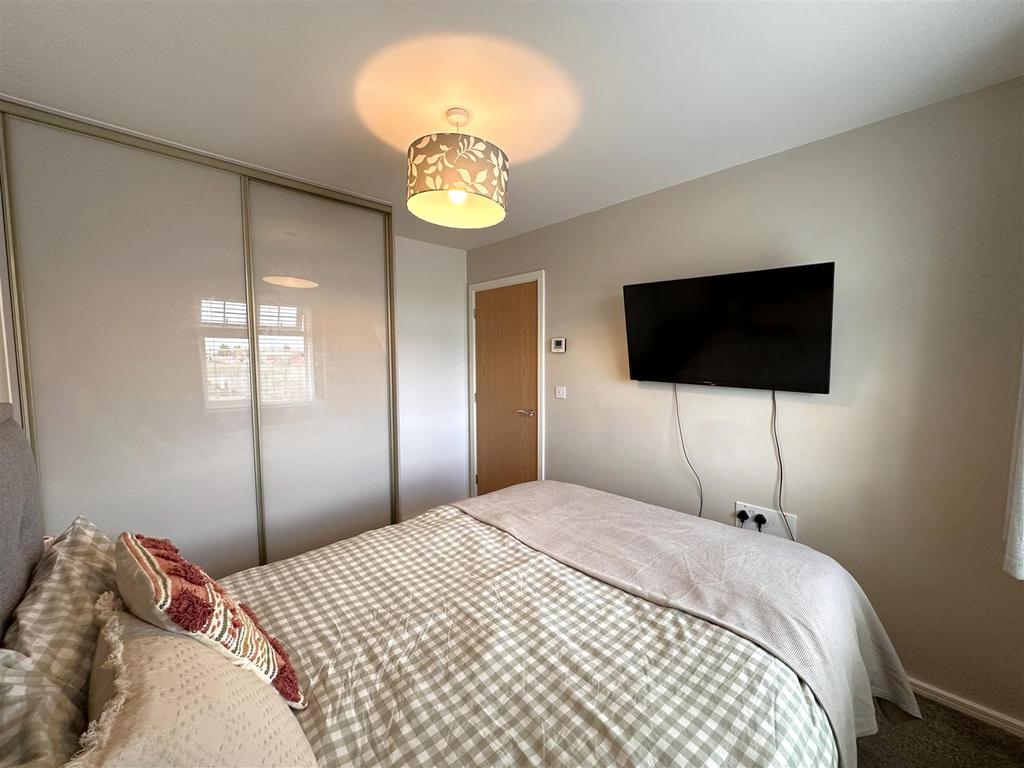 Bedroom One With Fitted Wardrobes 980