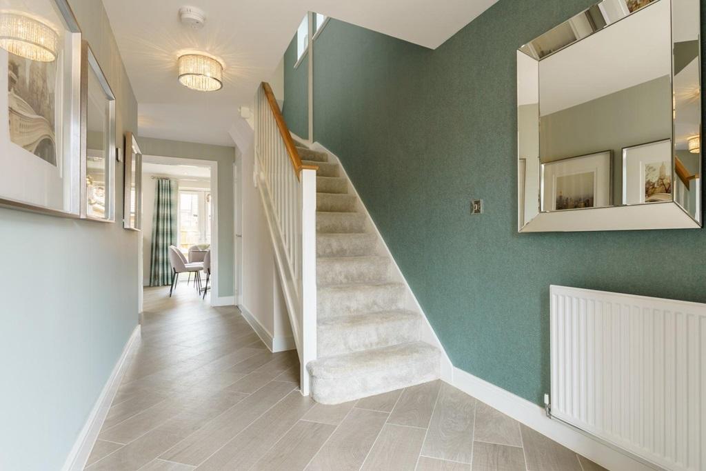 Bright and spacious hallway with under stair...