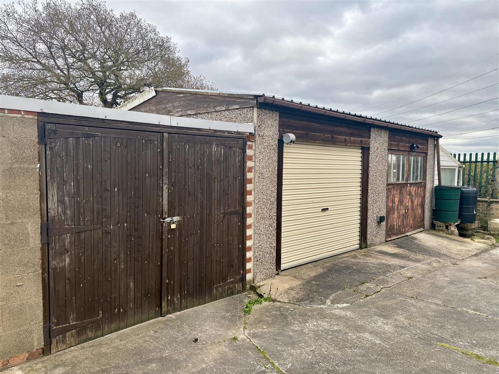Double garage and outbuilding