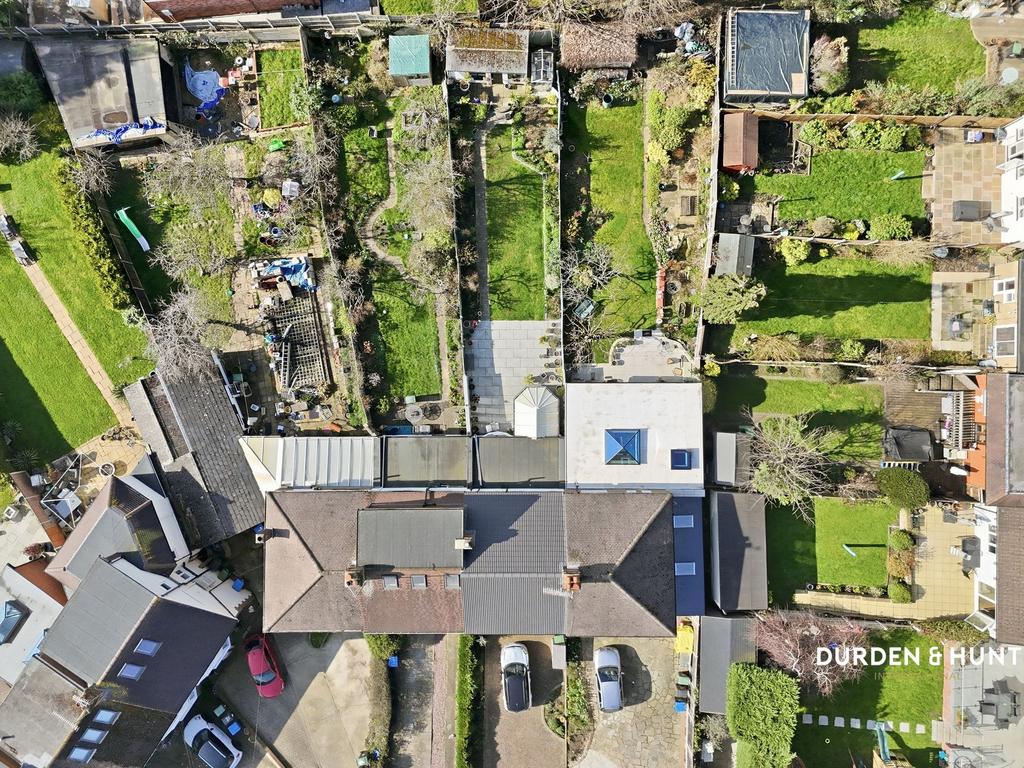 Street scene with property, garden