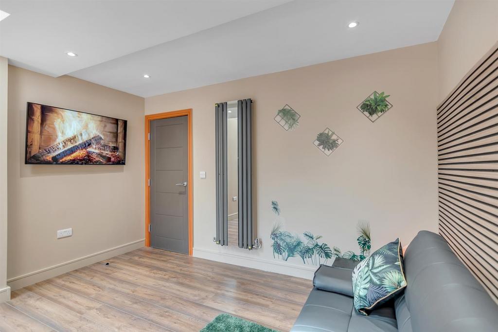 Stylish living area with sofa and wall art...