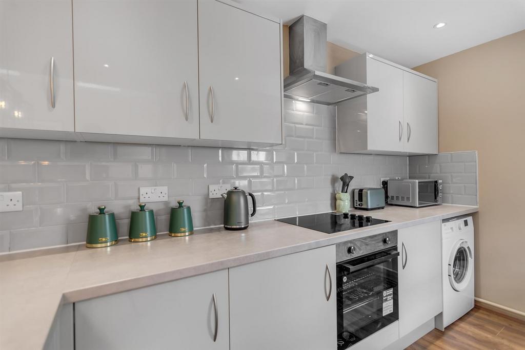 Modern fitted kitchen with appliances...