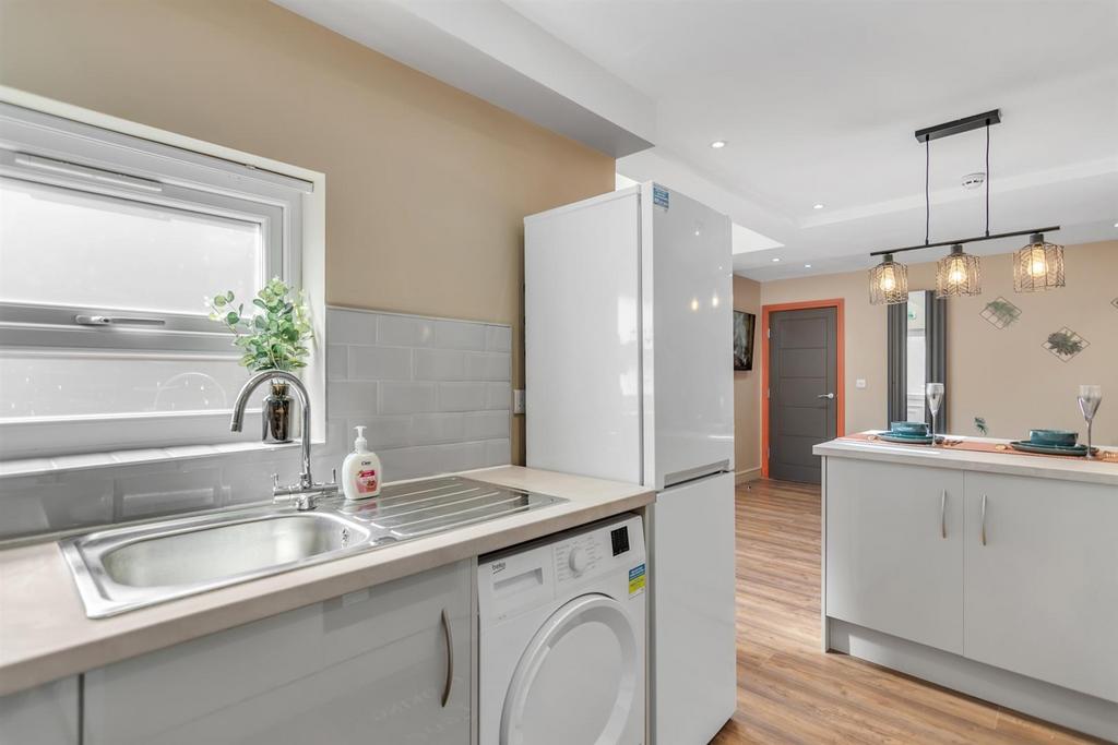 Bright modern kitchen with breakfast bar...