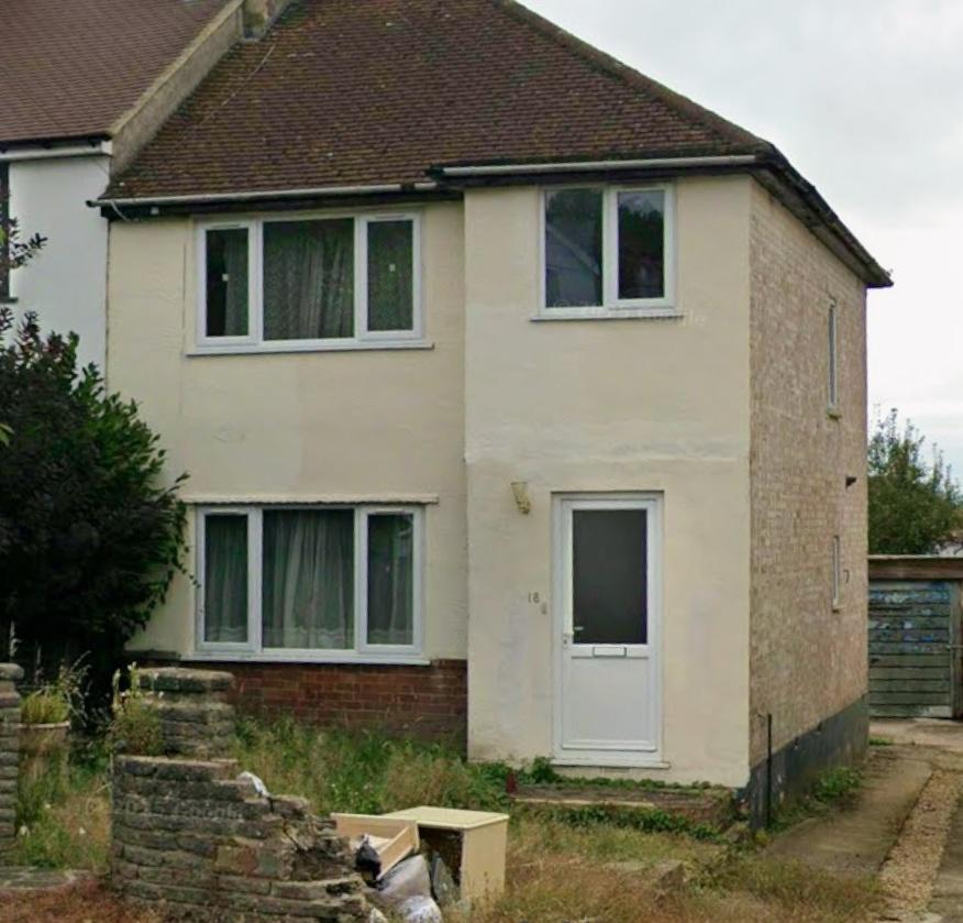Semi‑detached house with driveway and front gar...