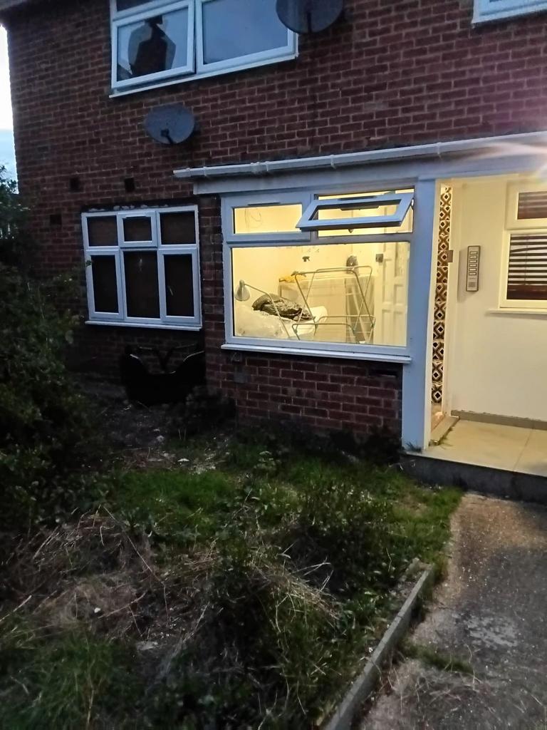 Traditional brick home with welcoming entrance...