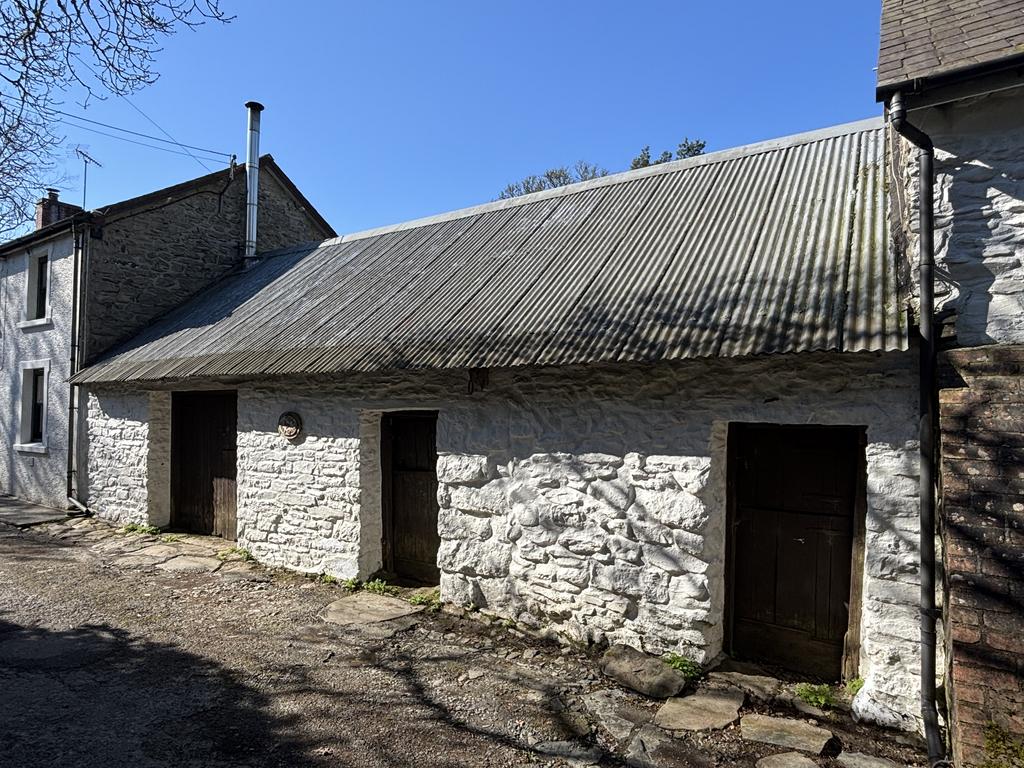 Adjoining stone barn