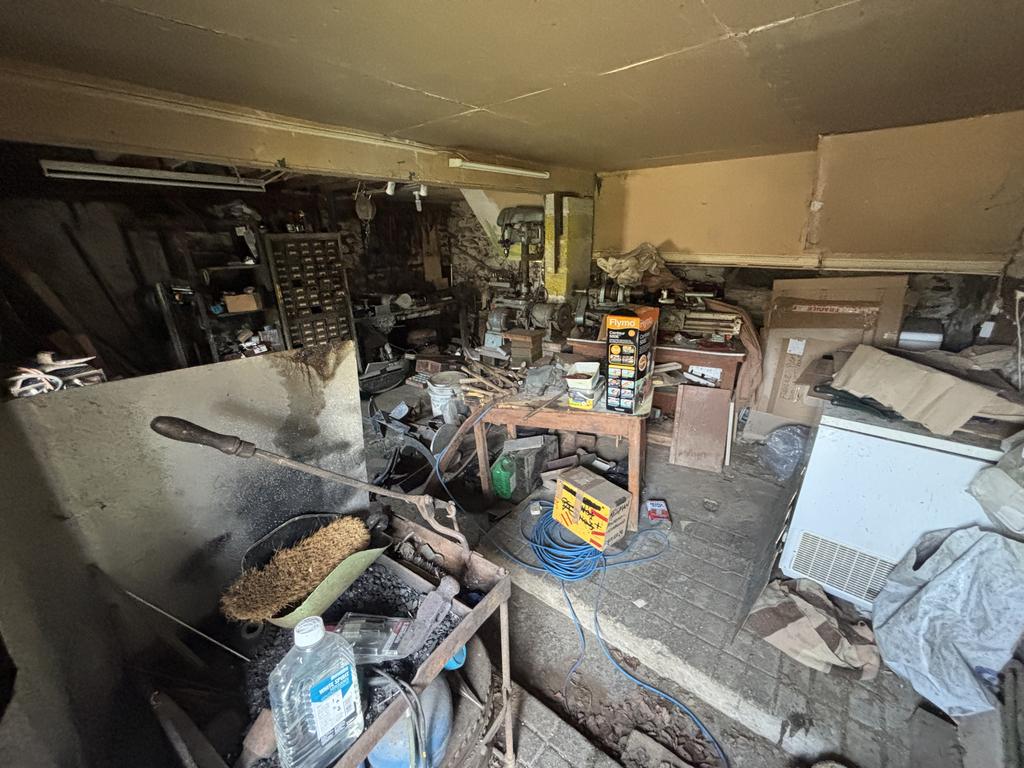 Adjoining former cow shed/workshop