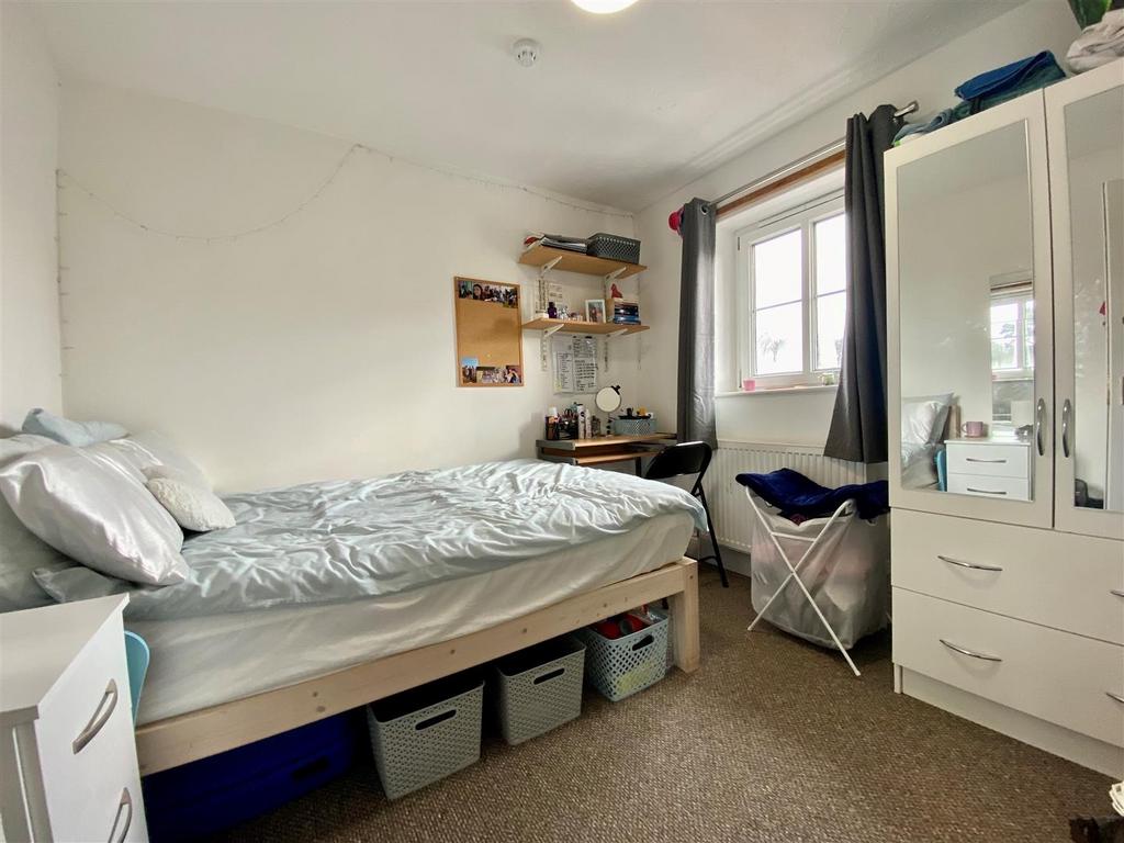 Bright, tidy bedroom with ample storage...