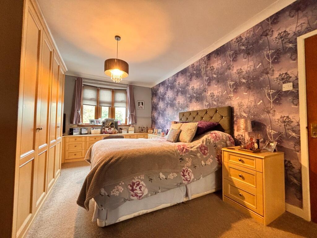 Bedroom with fitted wardrobes