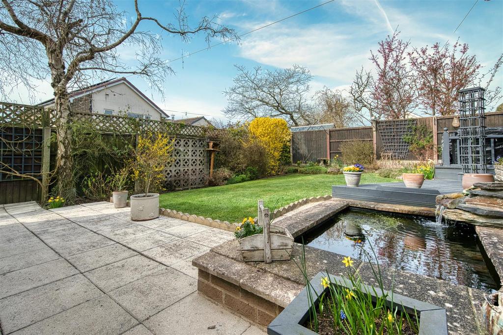 Rear Garden - pond and lawn.jpg