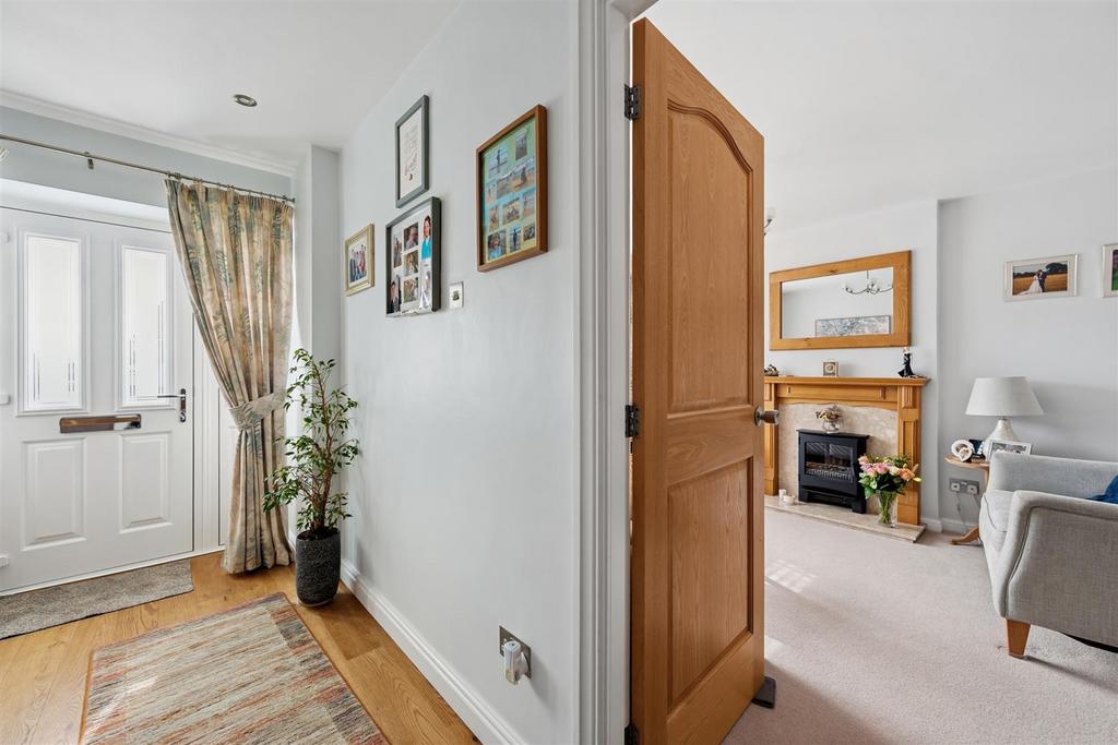 Entrance Hallway and Sitting Room.jpg