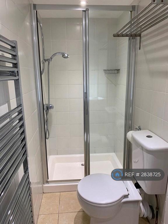Fully Tiled Bathroom