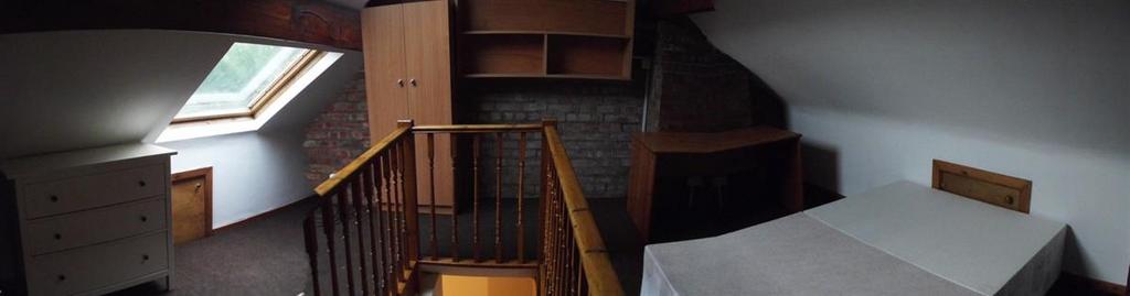 Bright attic double room with built-in storage...
