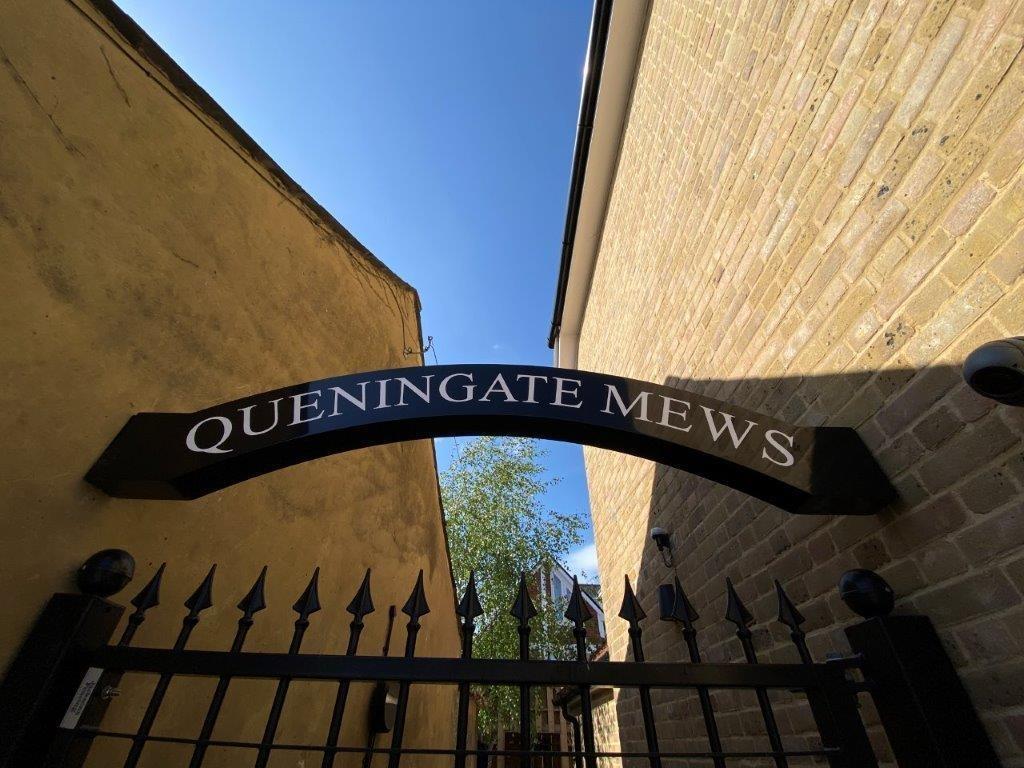 Gated entrance with attractive stonework and cl...