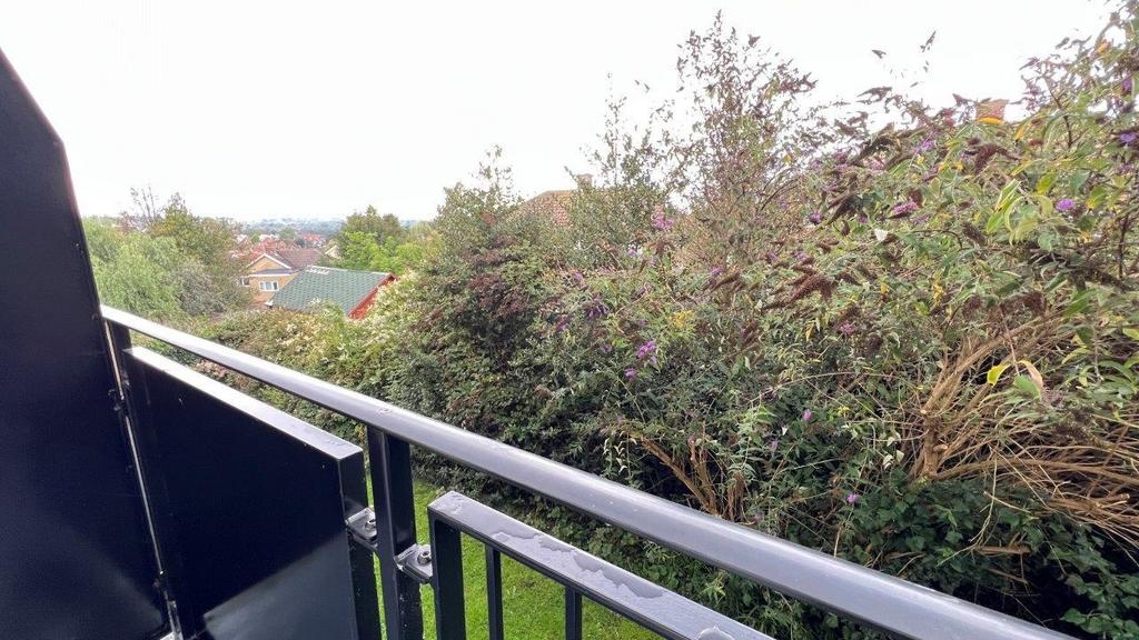 Balcony with leafy outlook and distant views...