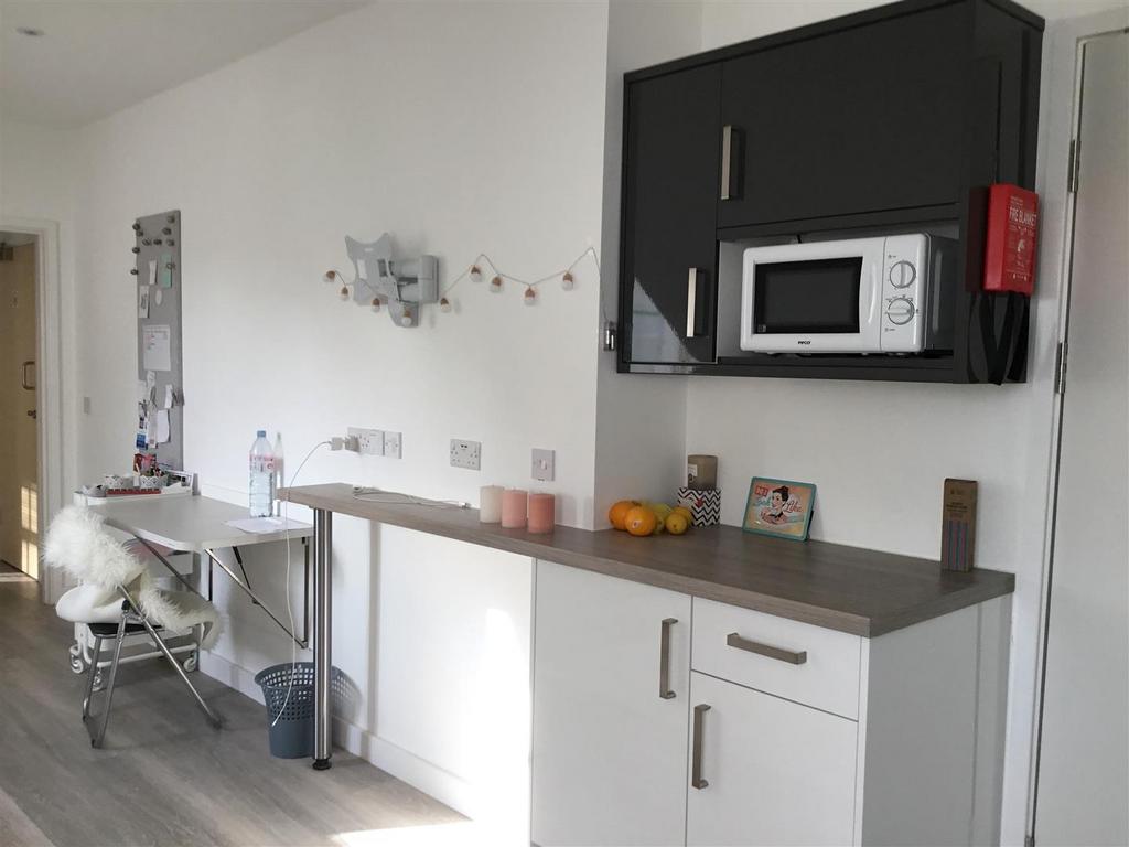 Bright modern kitchenette with breakfast bar...