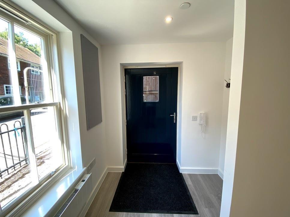 Bright entrance hall with natural light and nea...