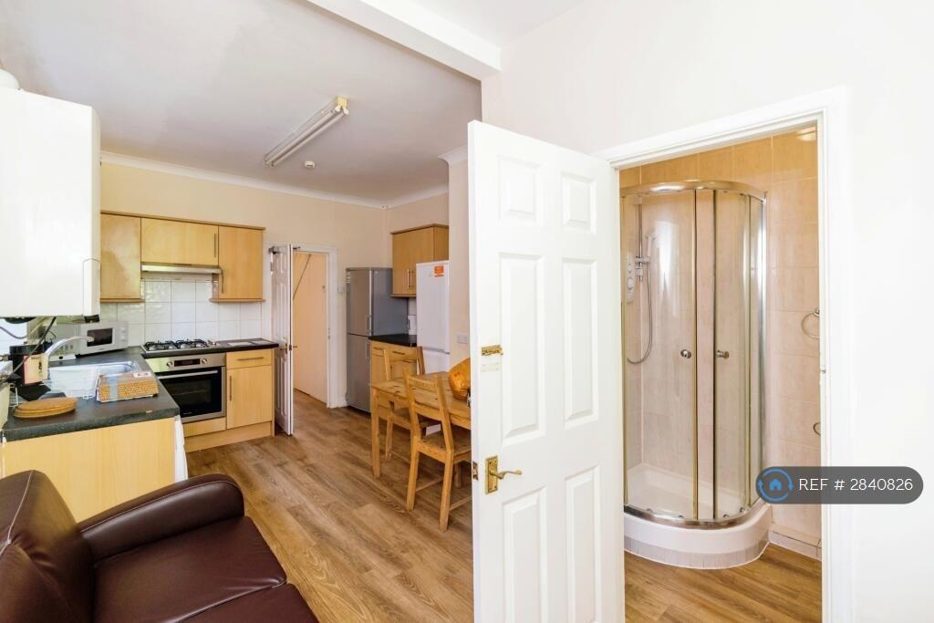 Kitchen And Downstairs Bathroom