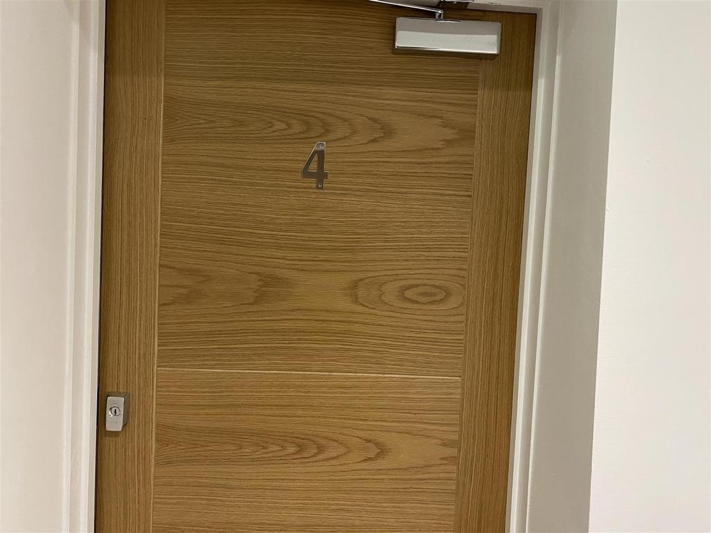 Modern wooden door with secure entry system...