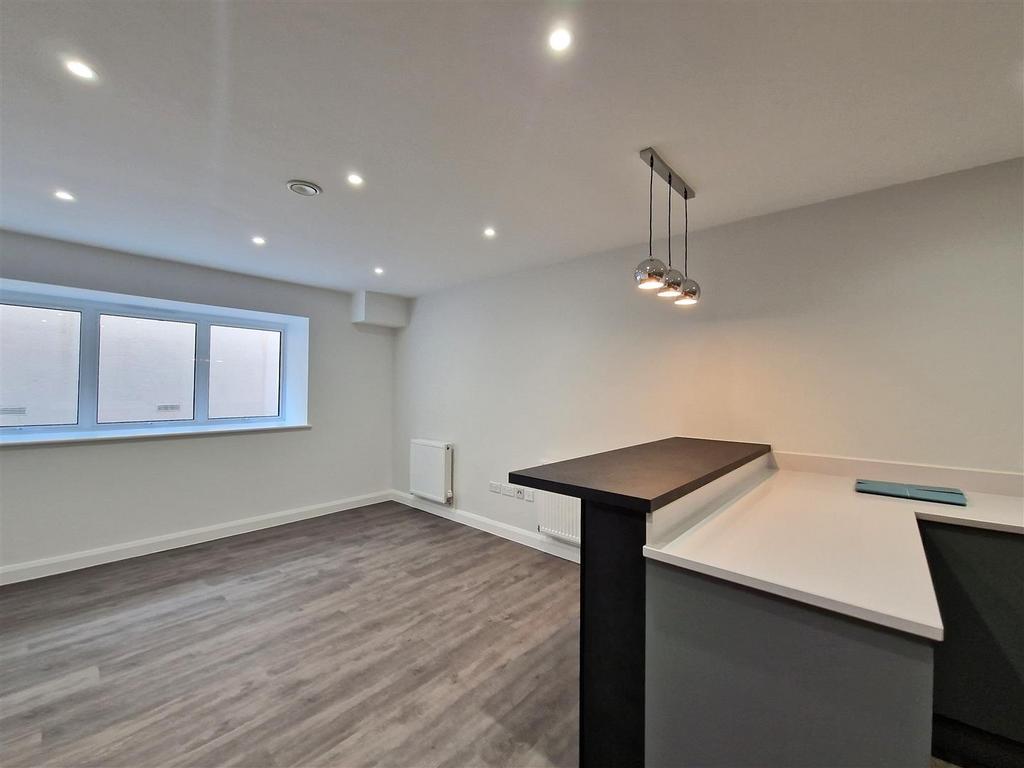 Modern open plan kitchen with breakfast bar...