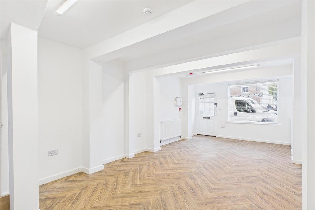 Bright open-plan space with stylish flooring...