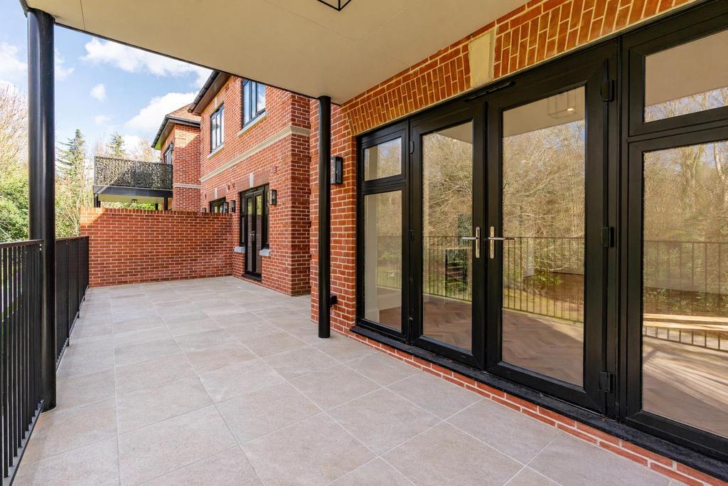 Spacious patio with modern black accents.png
