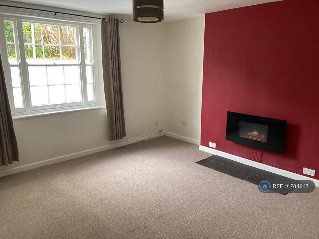 View Of Lounge With Feature Fireplace