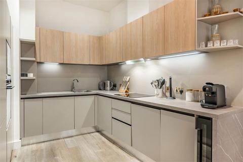 2 bedroom flat to rent, Eastcastle Street, London W1T