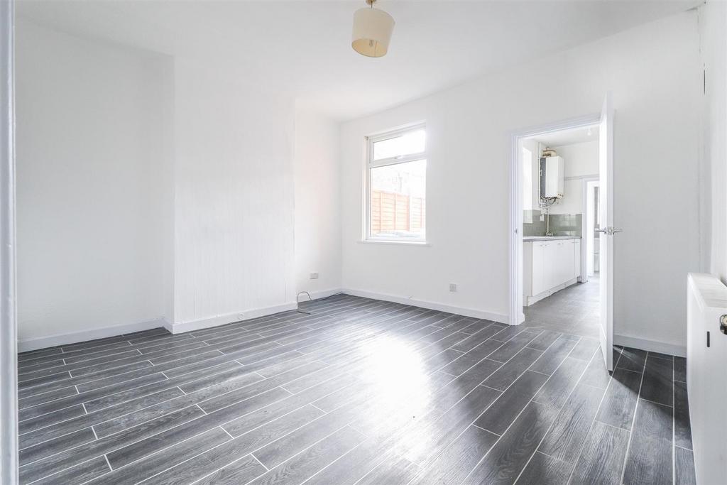 Bright and airy room with sleek modern flooring...