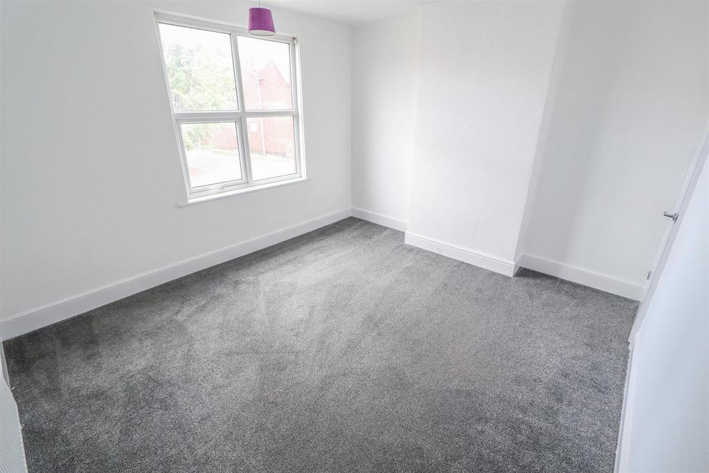 Bright and airy bedroom with fresh grey carpet...