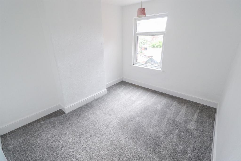 Bright, airy room with fresh plush gray carpet...