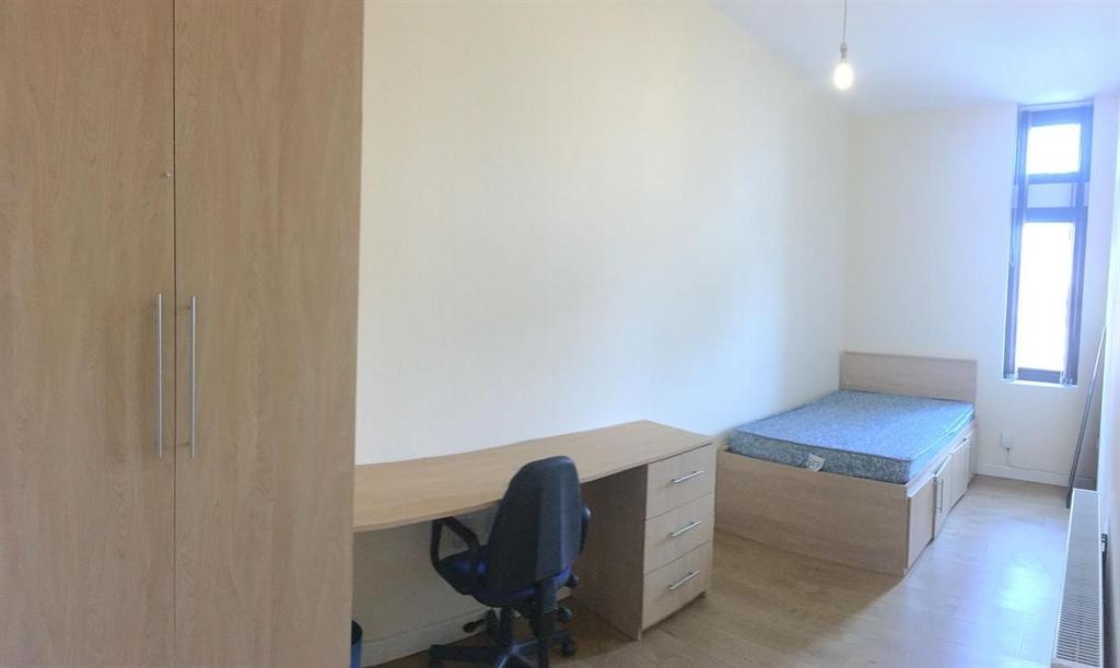 Bright master bedroom with spacious study area...