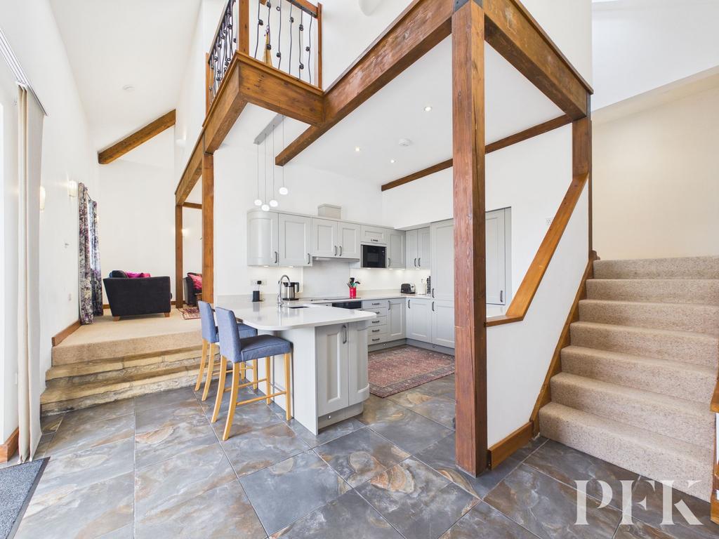 Kitchen with stairs to first floor