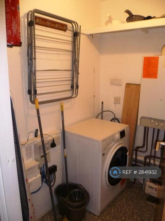 Utility Room With New Washer Dryer
