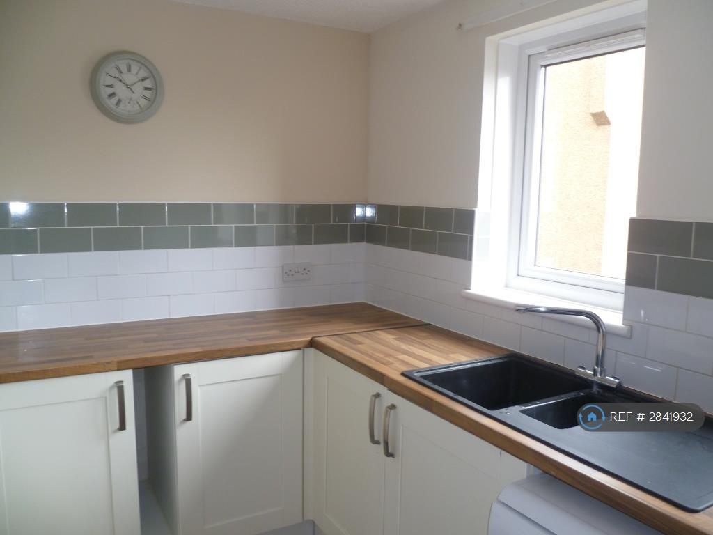 Kitchen Showing  Sink And Range Of Modern Units